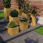 Бетонне кашпо для квітів жовто-гірчичне