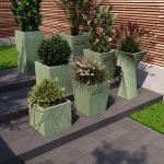Бетонне кашпо для квітів зелене