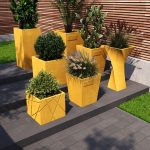 Бетонне кашпо для квітів жовте